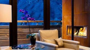 Miller Suite | Living area | 47-inch flat-screen TV with cable channels, TV, fireplace