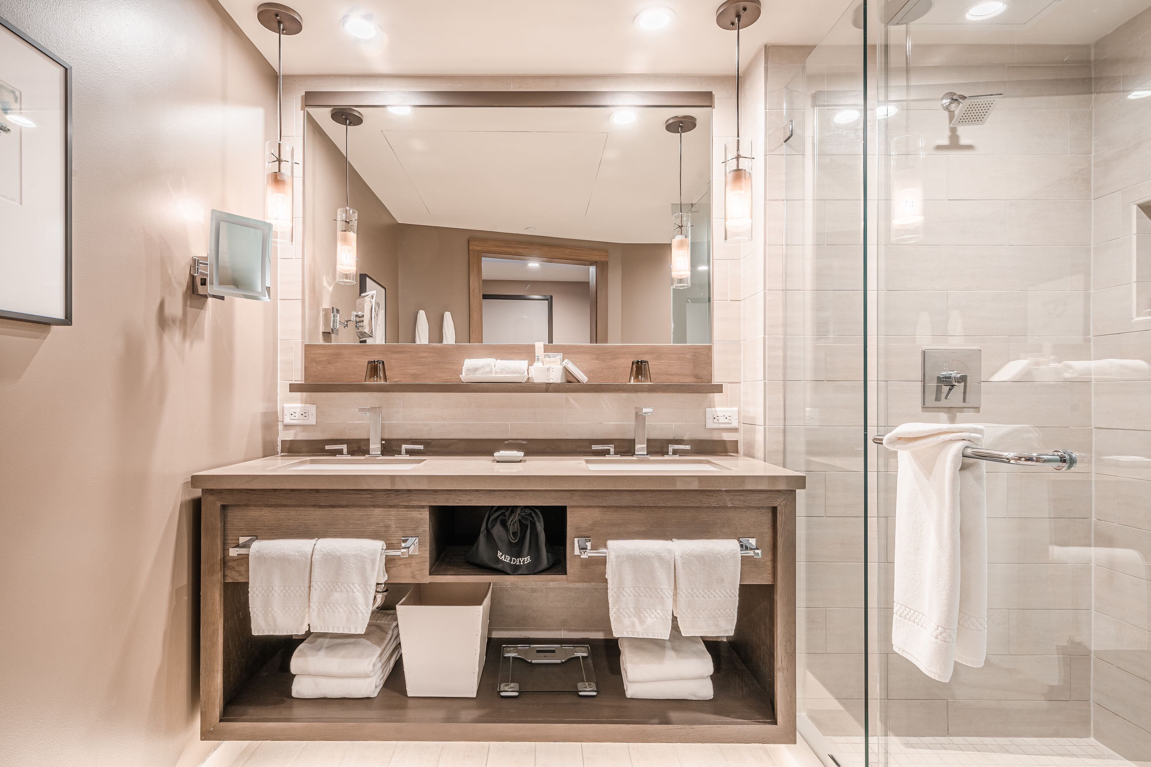 designer toiletries, hair dryer, bathrobes, slippers