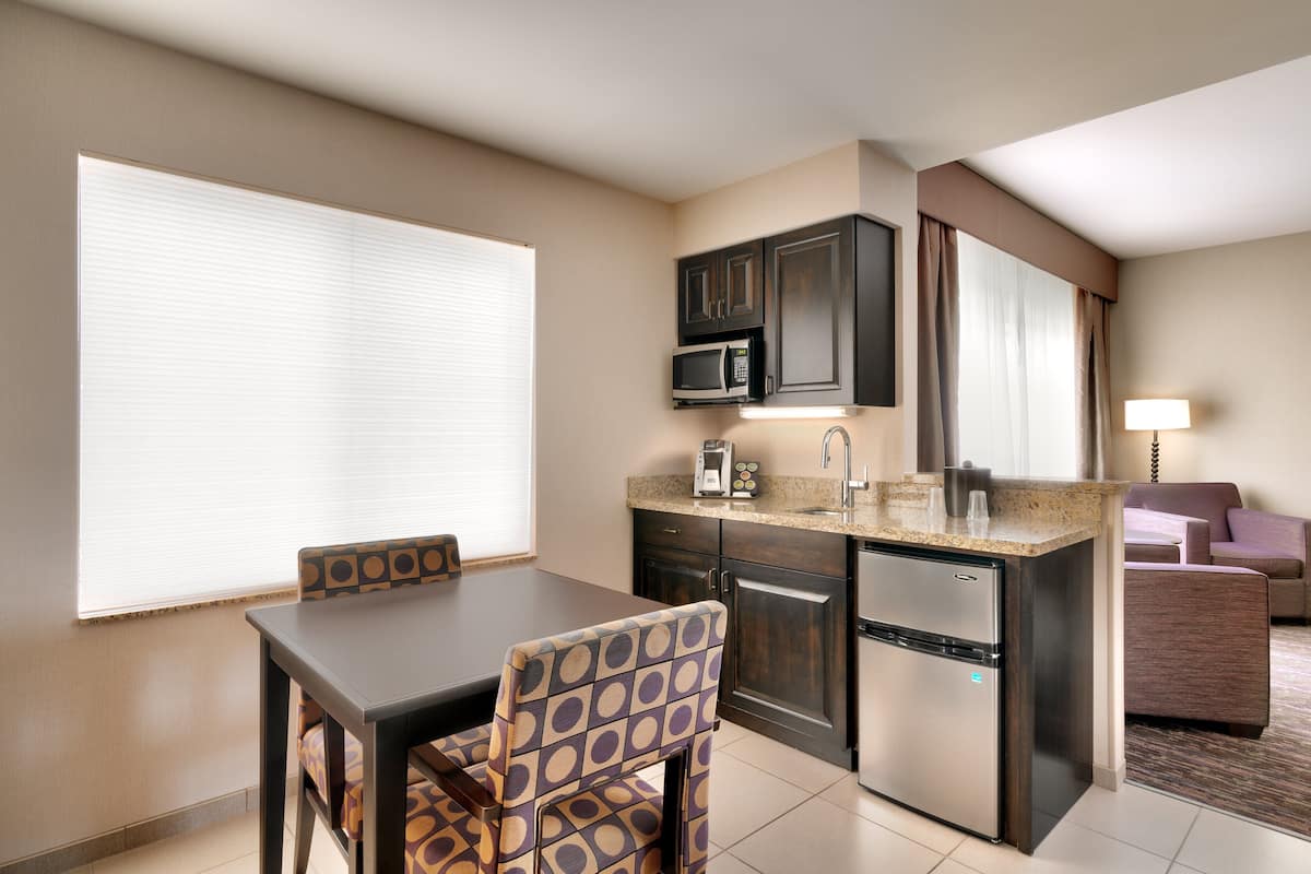 Desk, laptop workspace, blackout curtains, iron/ironing board