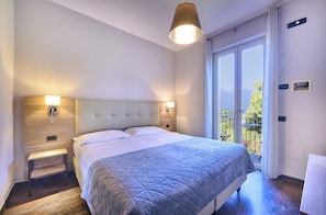 Double or Twin Room, Balcony, Partial Lake View | Premium bedding, in-room safe, iron/ironing board, free WiFi