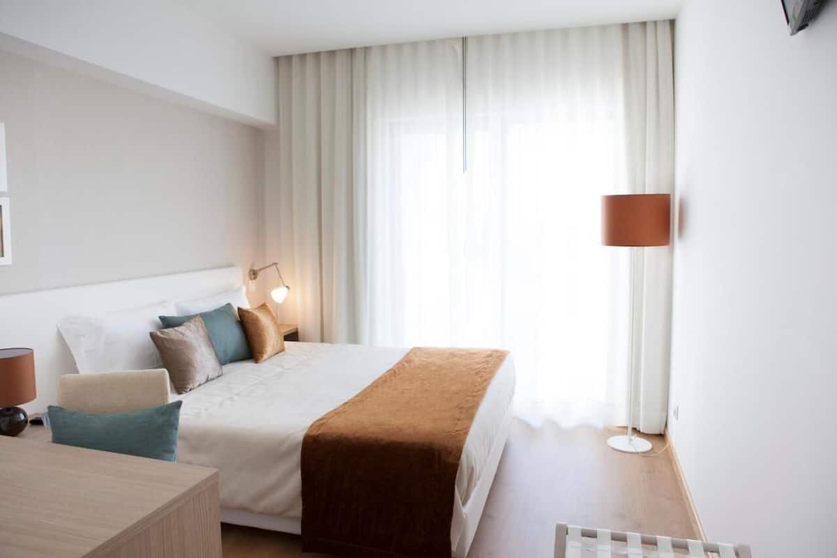 Minibar, blackout drapes, soundproofing, iron/ironing board (on request)