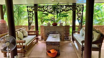 1 Bedroom Villa | Living area | 30-inch TV with satellite channels
