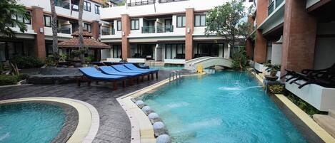 Outdoor pool, sun loungers