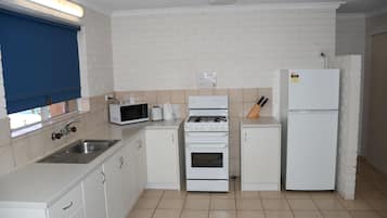 Two Bedroom Waterfront Unit | Private kitchen | Fridge, microwave, coffee/tea maker, electric kettle