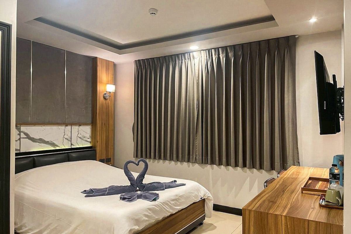 Minibar, Zimmersafe, Verdunkelungsvorhänge, Bügeleisen/Bügelbrett