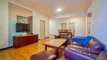 Apartment, 3 Bedrooms, Balcony | Living area | LCD TV