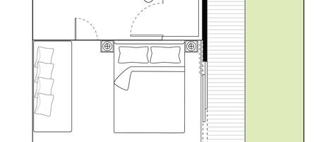 Un plan d’étage d’une chambre d’hôtel comprenant un lit, un bureau, une salle de bain et un petit coin salon.