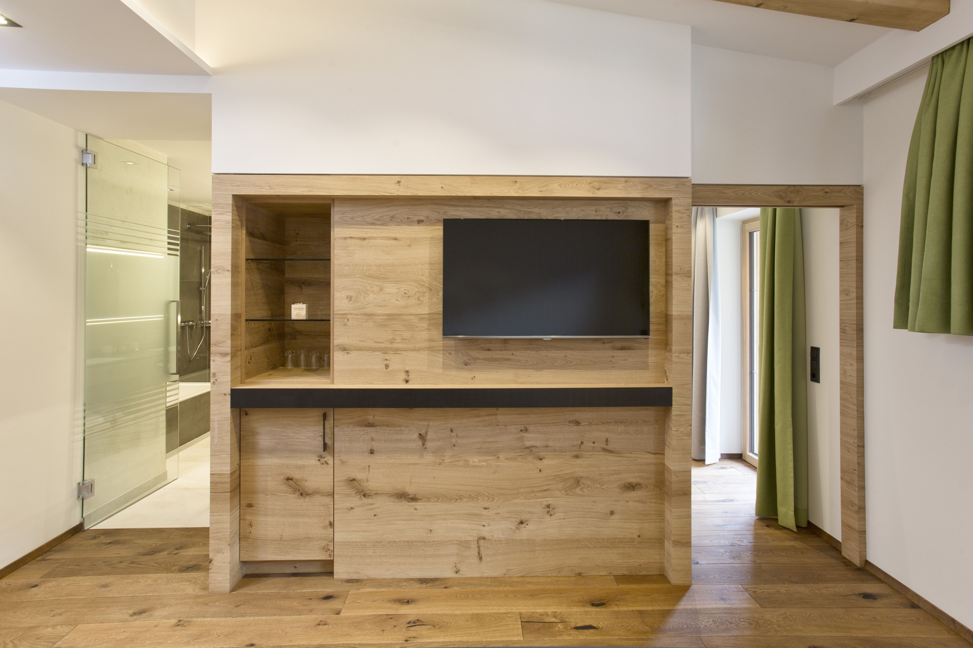 superior suite, 1 king bed with sofa bed, balcony, annex building | living area | lcd tv, ping pong, books