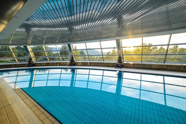 Indoor pool, free pool cabanas, pool umbrellas