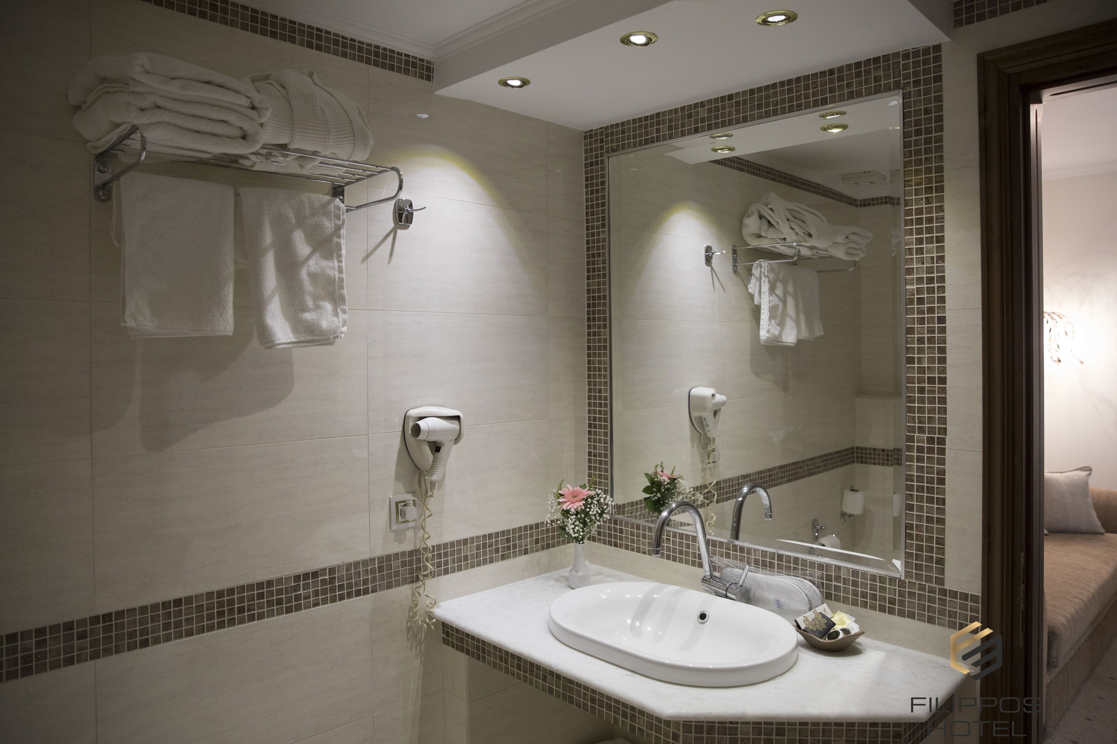 studio suite | bathroom | free toiletries, hair dryer, slippers, towels