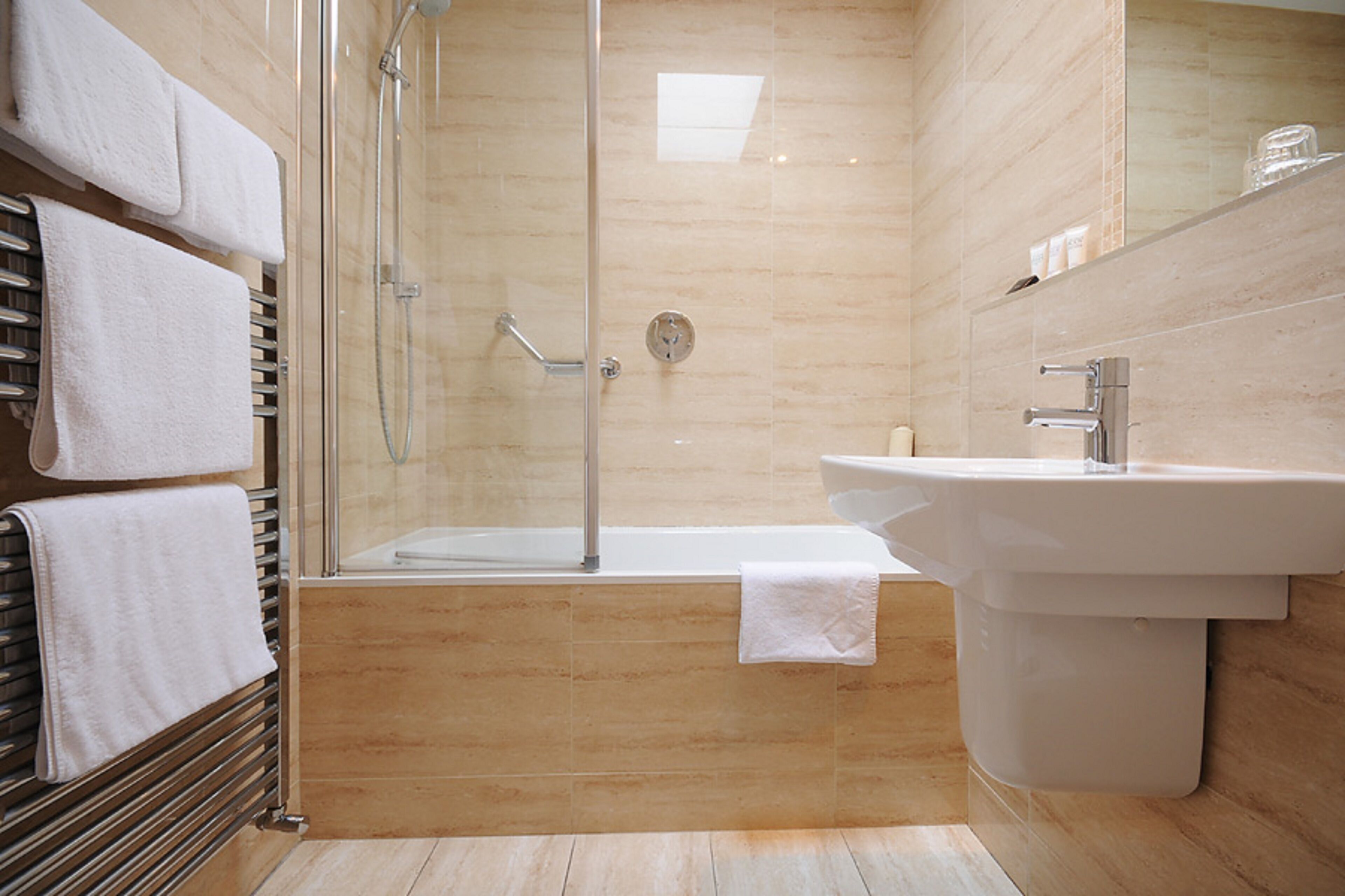 combined shower/bathtub, free toiletries, hair dryer, towels