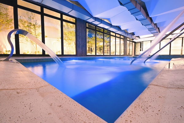 Indoor pool, open 1:00 PM to 9:00 PM, sun loungers