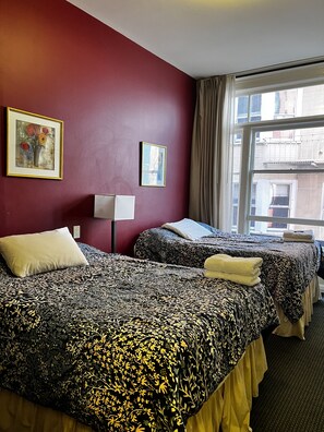 Habitación triple (Private) | Cortinas blackout, tabla de planchar con plancha y wifi gratis