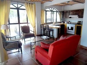 Suite, 1 Bedroom | Living area | Flat-screen TV, DVD player - Lolitas Inn (Ajijic)