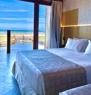 Deluxe Frente Mar | 1 quarto, cofres nos quartos, individualmente decorados