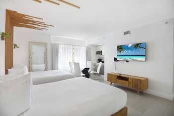Family Suite, 2 Bedrooms, Kitchen | Down comforters, in-room safe, soundproofing, iron/ironing board at Hotel Belleza