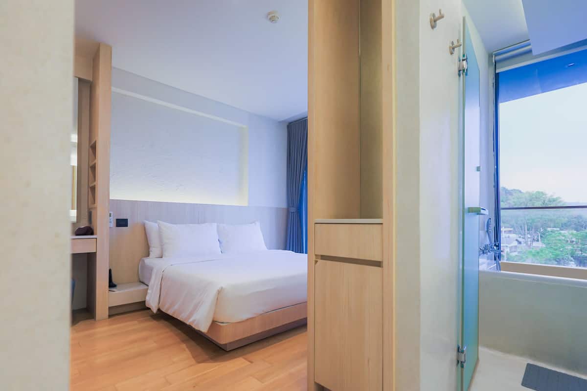 Suite superior | 1 habitación, caja de seguridad en la habitación y escritorio
