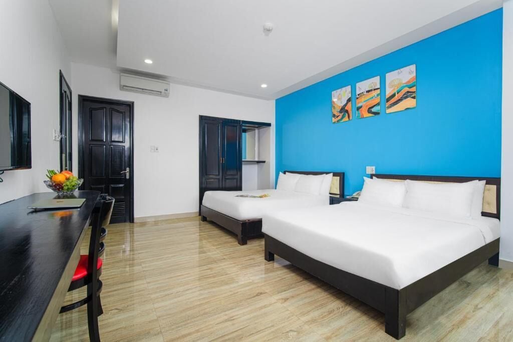 family quadruple room, 1 bedroom, non smoking, city view | minibar, individually furnished, desk, laptop workspace