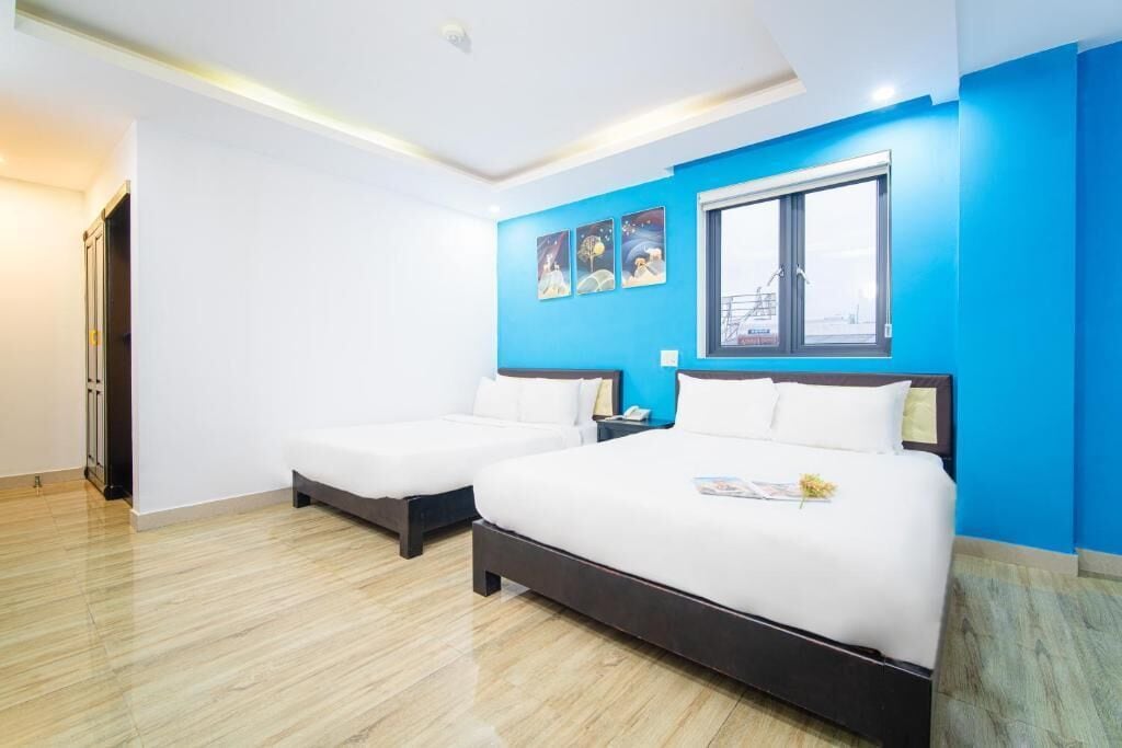 superior quadruple room, 2 queen beds | minibar, individually furnished, desk, laptop workspace