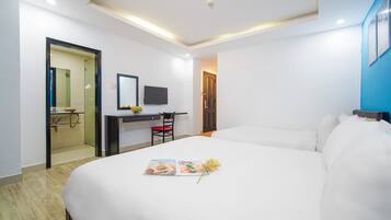 Superior Quadruple Room, 2 Queen Beds | Minibar, individually furnished, desk, laptop workspace