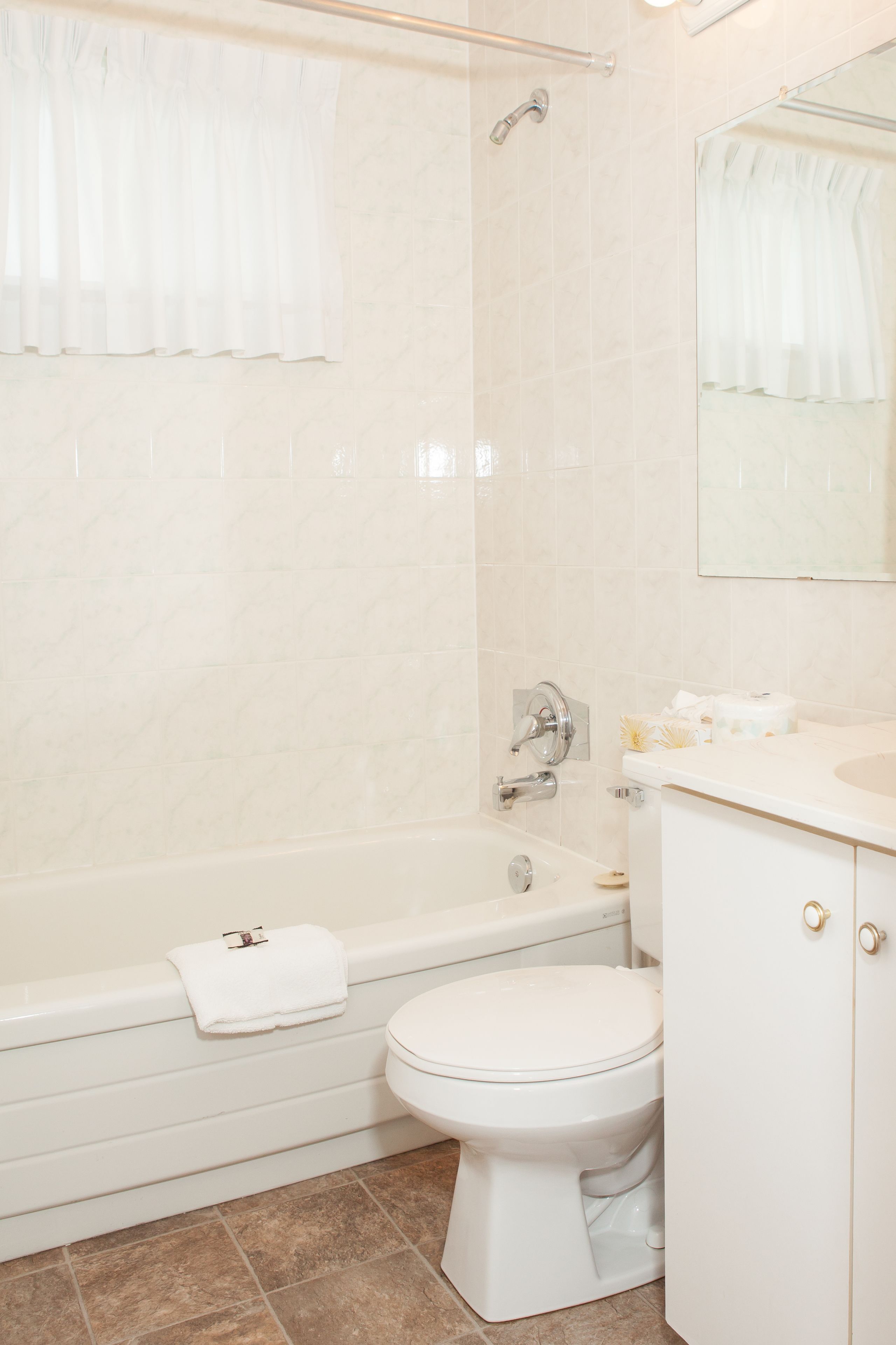 standard room, 2 queen beds | bathroom | hair dryer, towels