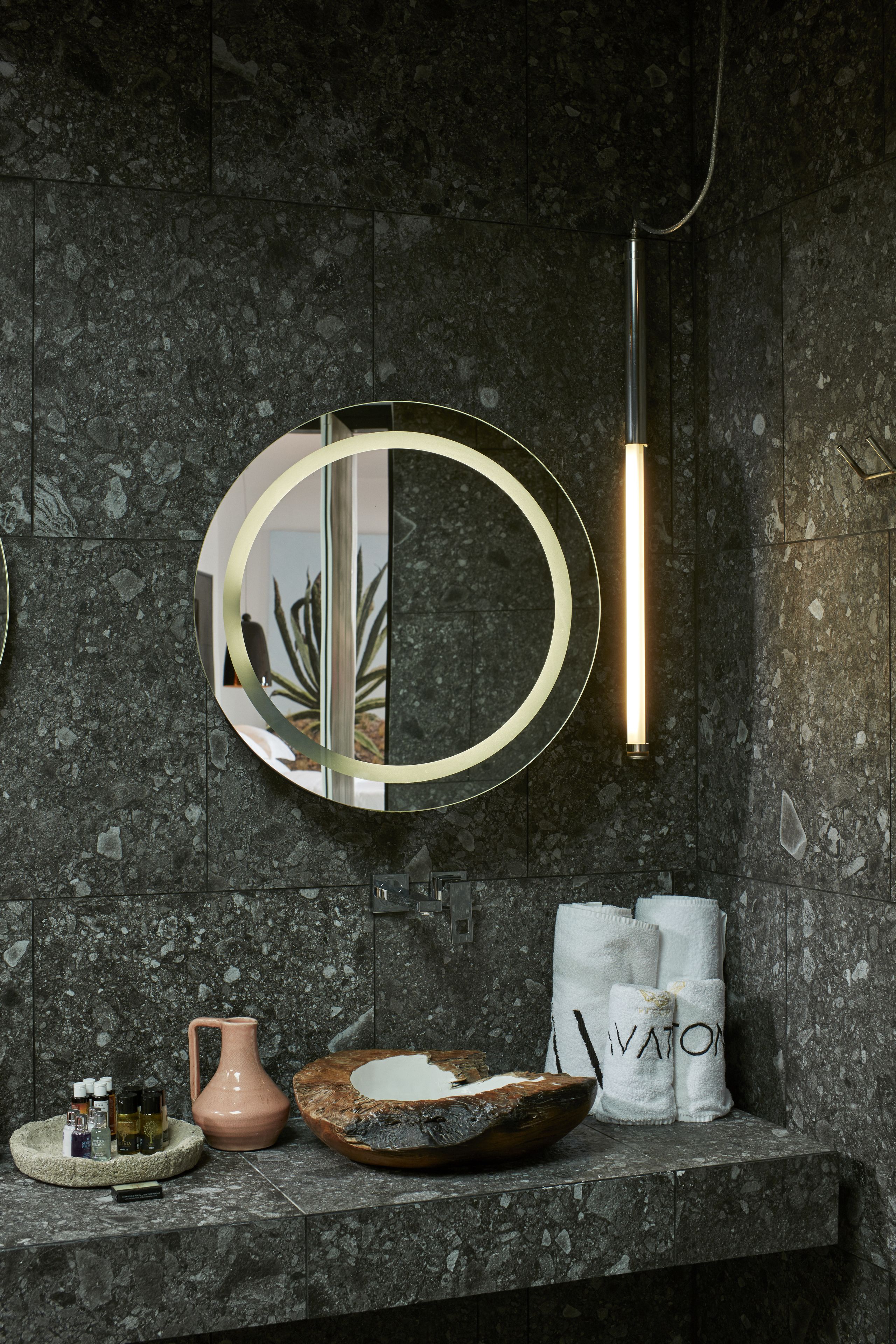 designer toiletries, hair dryer, bathrobes, slippers