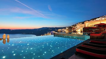 Seasonal outdoor pool, pool umbrellas, pool loungers