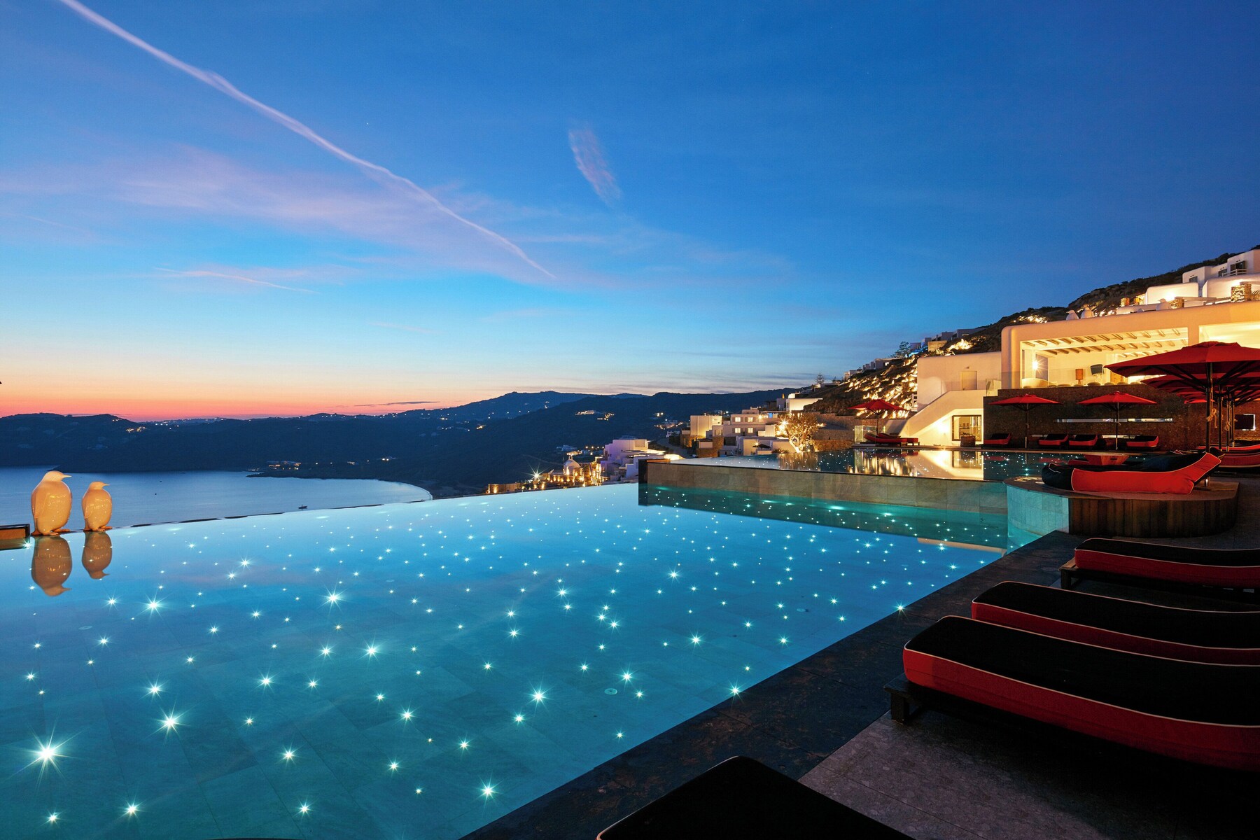 Seasonal outdoor pool, pool umbrellas, sun loungers
