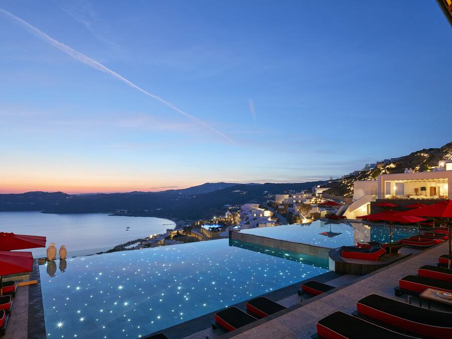 Seasonal outdoor pool, pool umbrellas, pool loungers