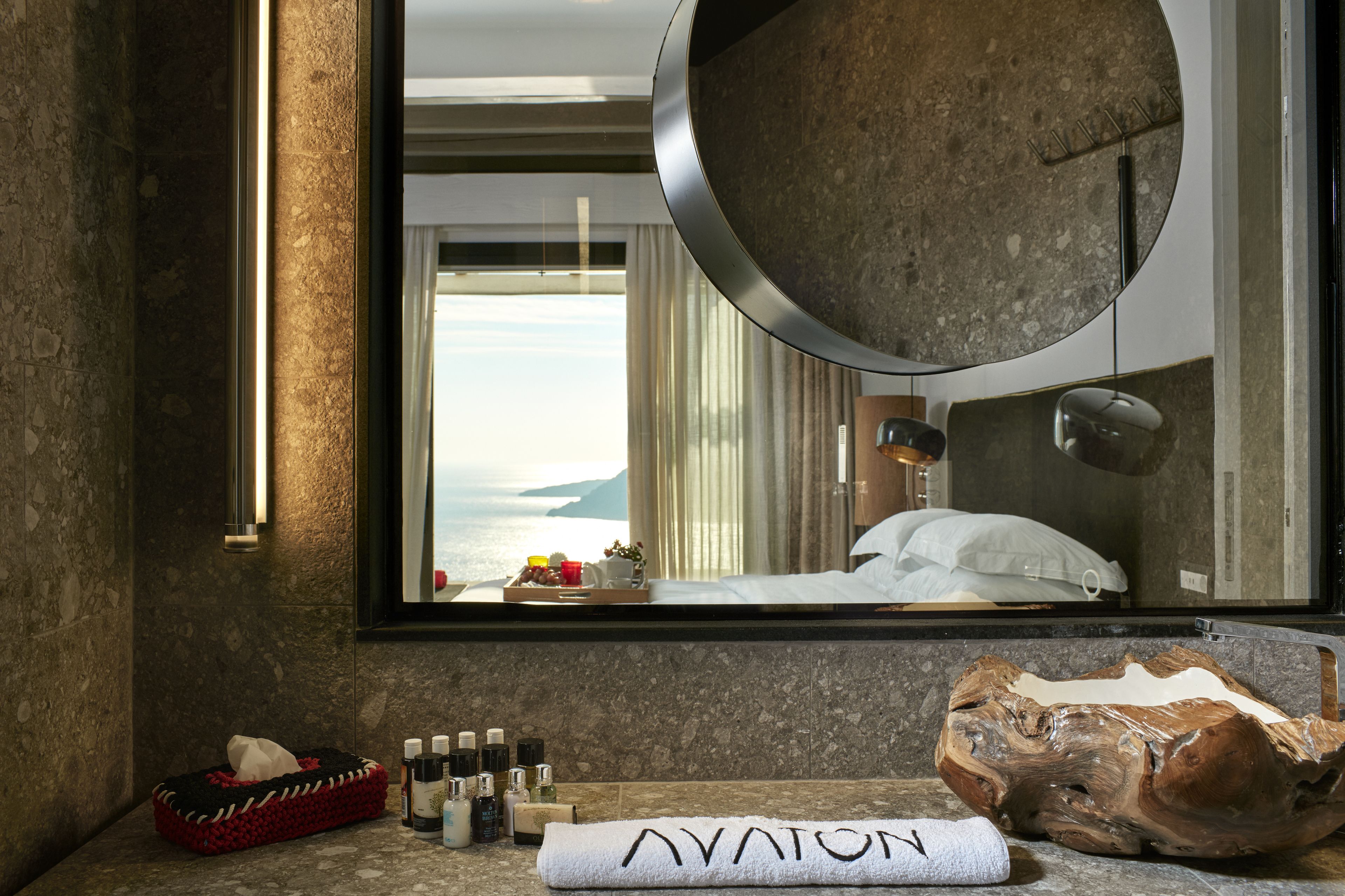 designer toiletries, hair dryer, bathrobes, slippers