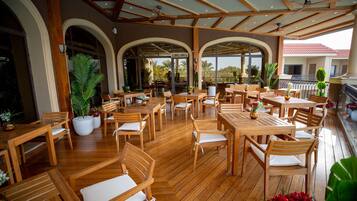 Daily buffet breakfast (USD 15.00 per person)
