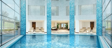 Indoor pool, outdoor pool, pool umbrellas, pool loungers