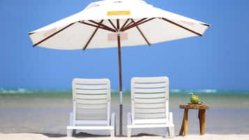 On the beach, beach towels, fishing