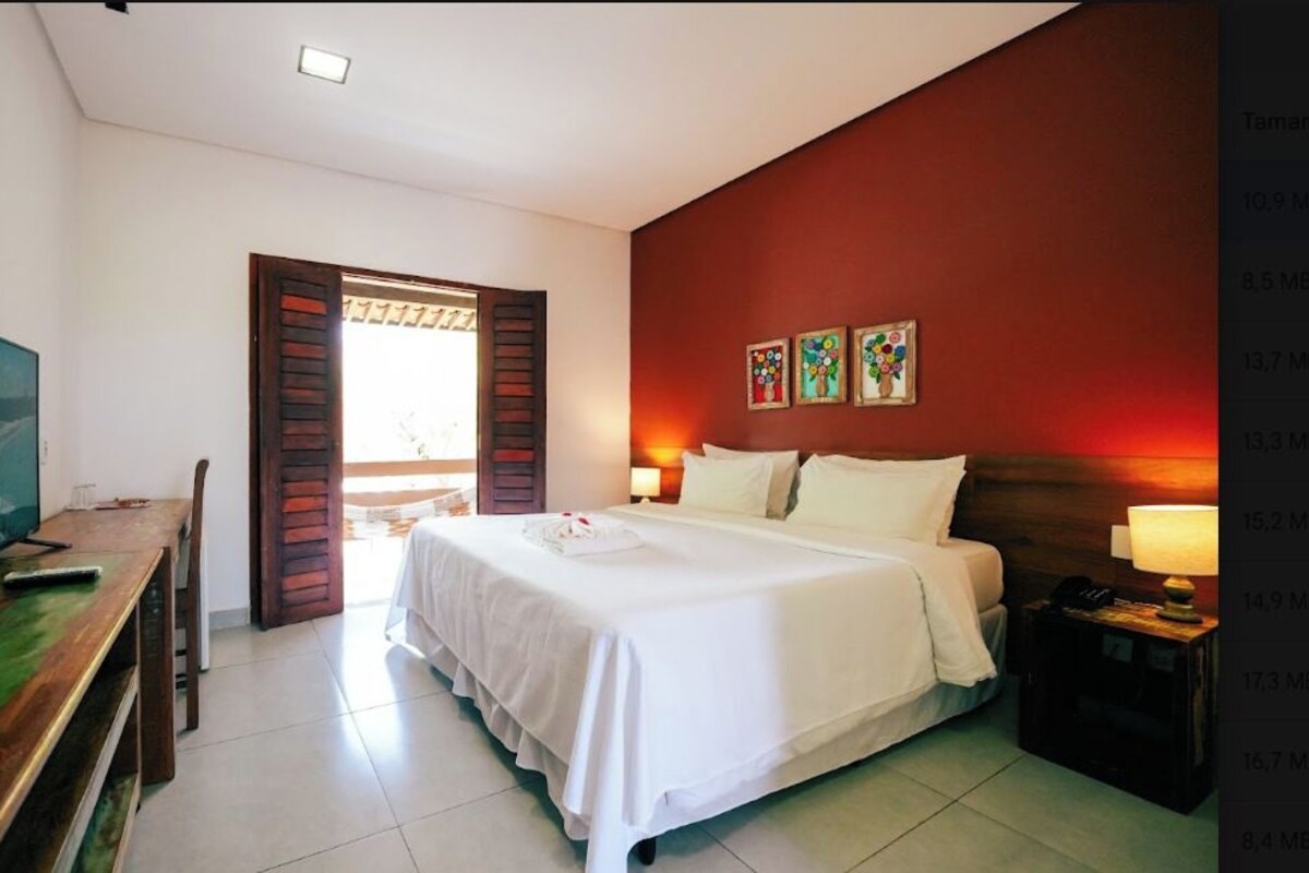 Suite Luxo Superior | Minibar, bed sheets