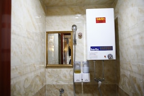 Shower, free toiletries, hair dryer, slippers