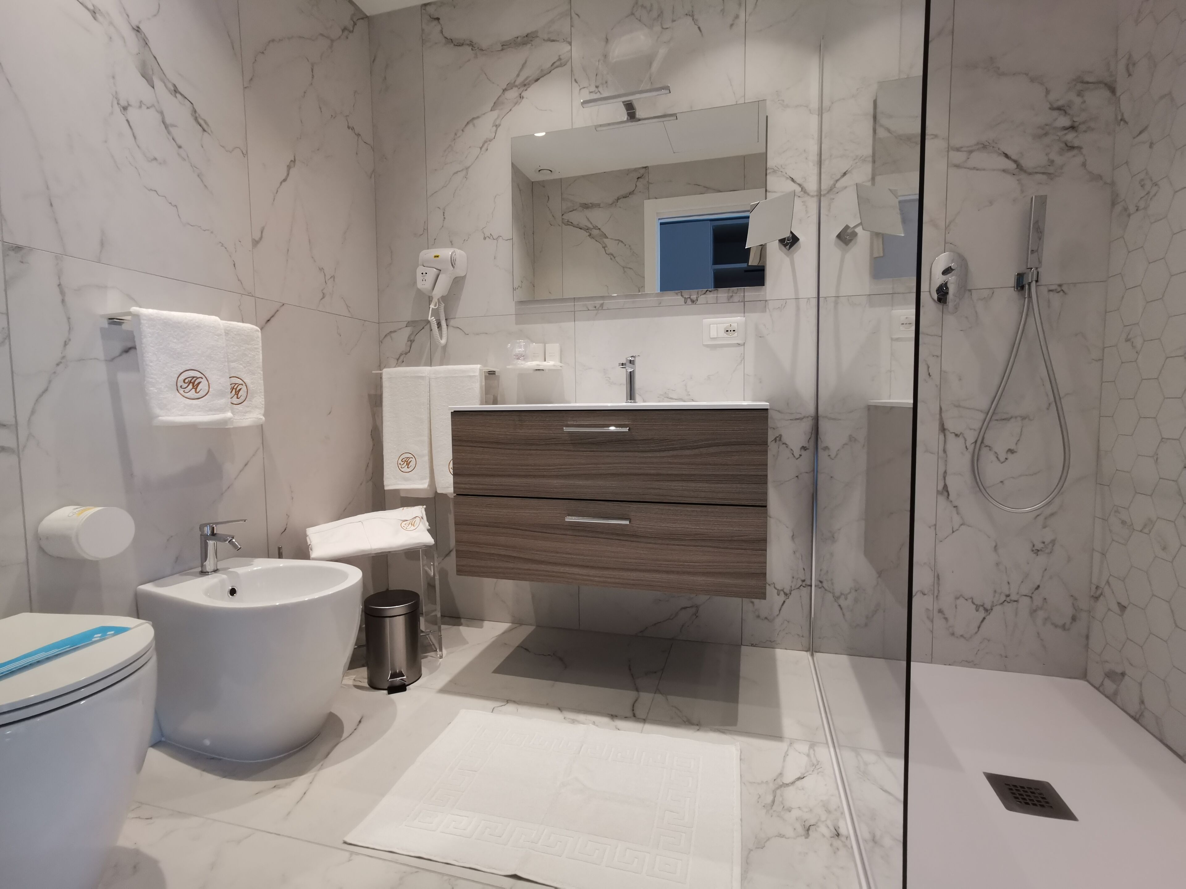 shower, free toiletries, hair dryer, slippers