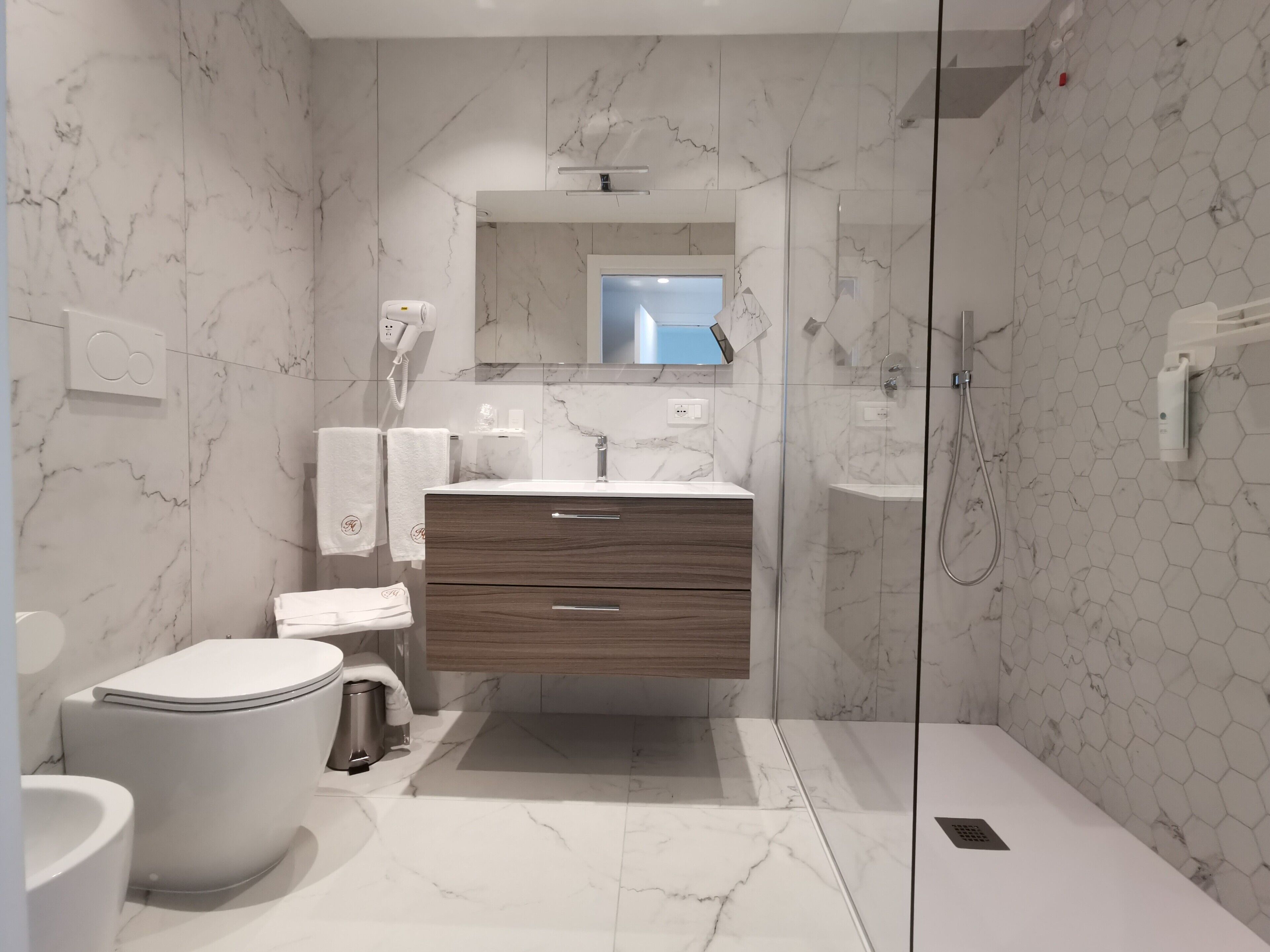 shower, free toiletries, hair dryer, slippers