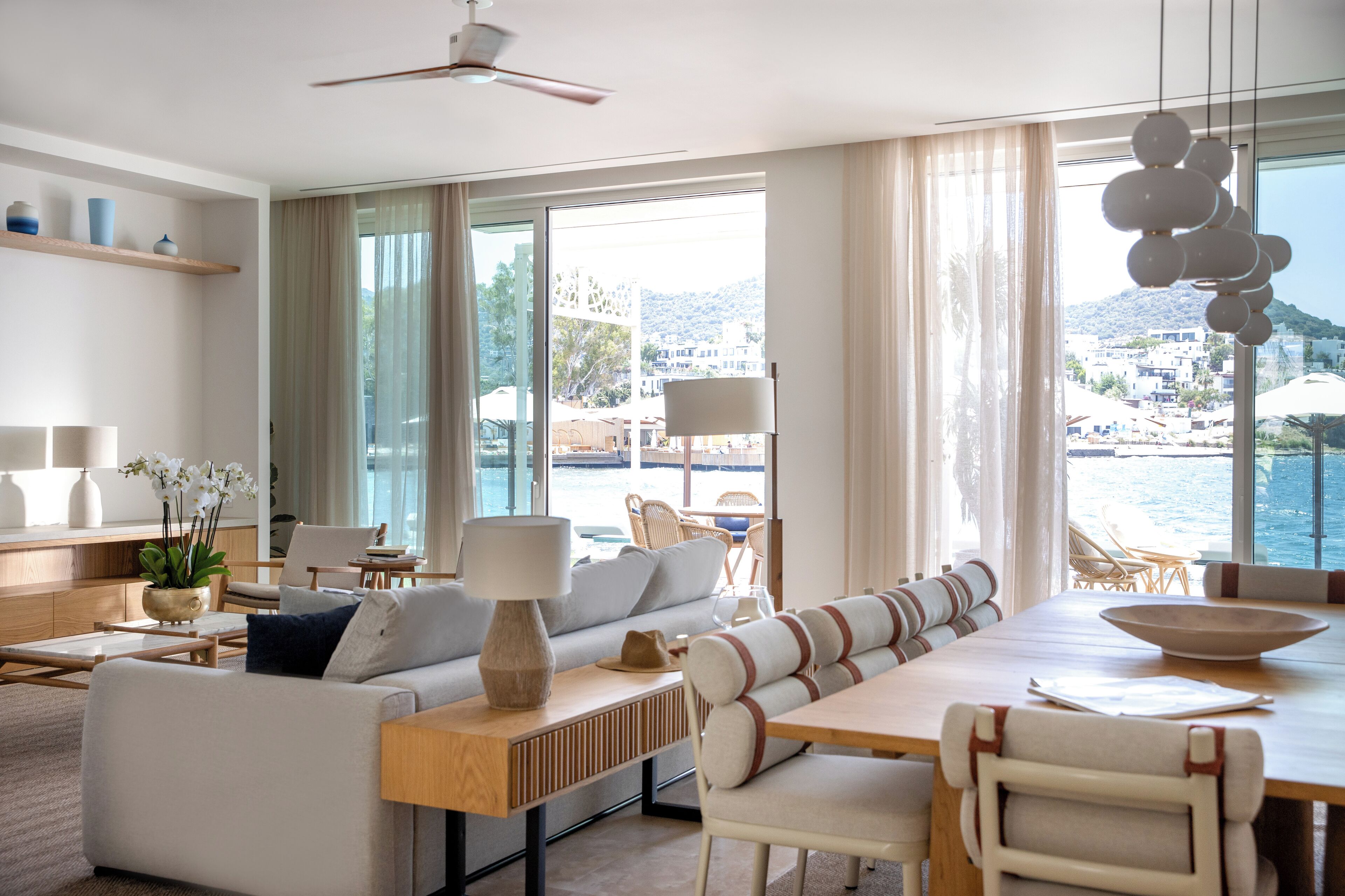 premium suite, 2 bedrooms, private pool, sea view (panoramic) | living area | lcd tv, heated floors