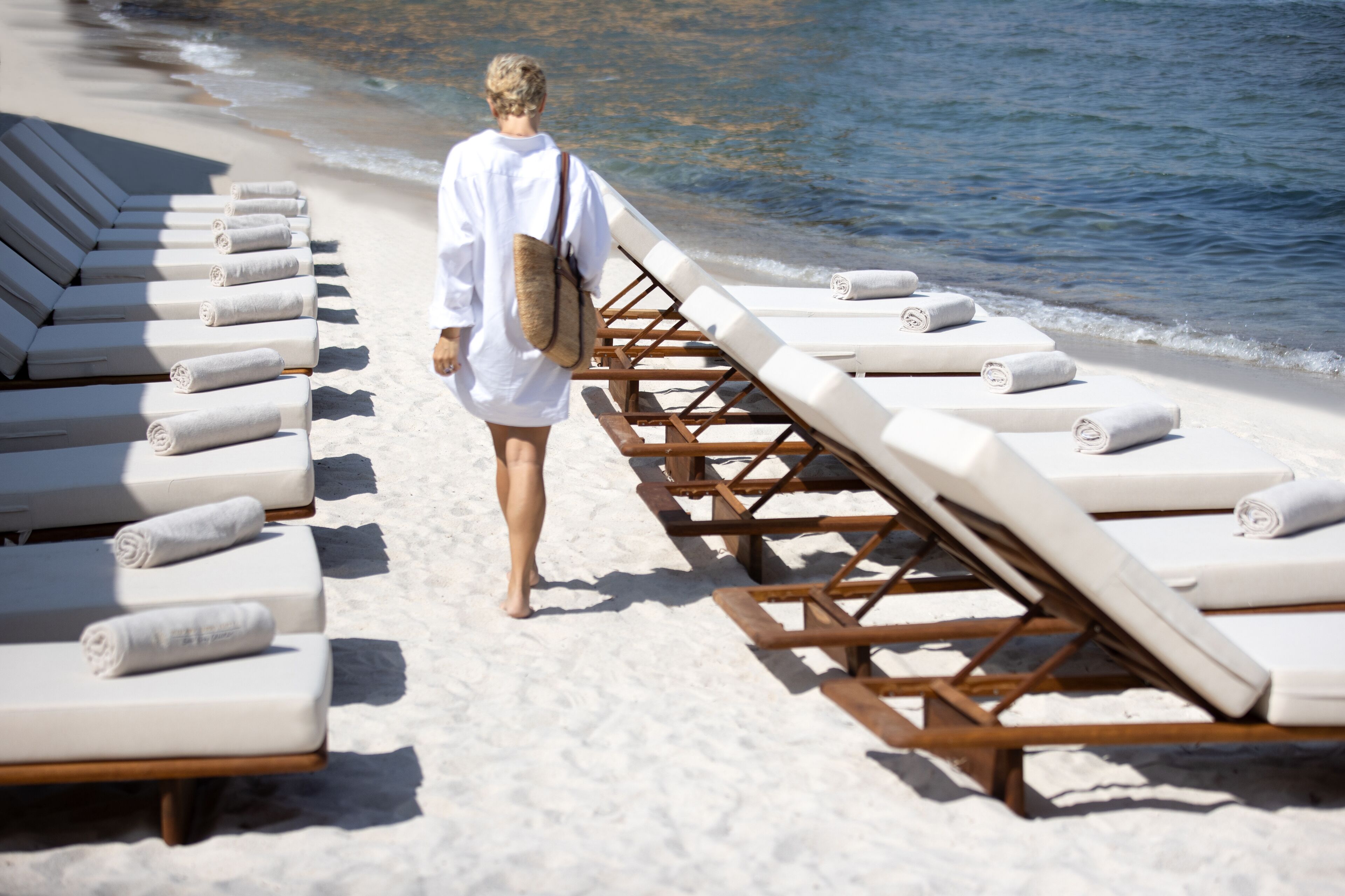 private beach, white sand, sun-loungers, beach umbrellas