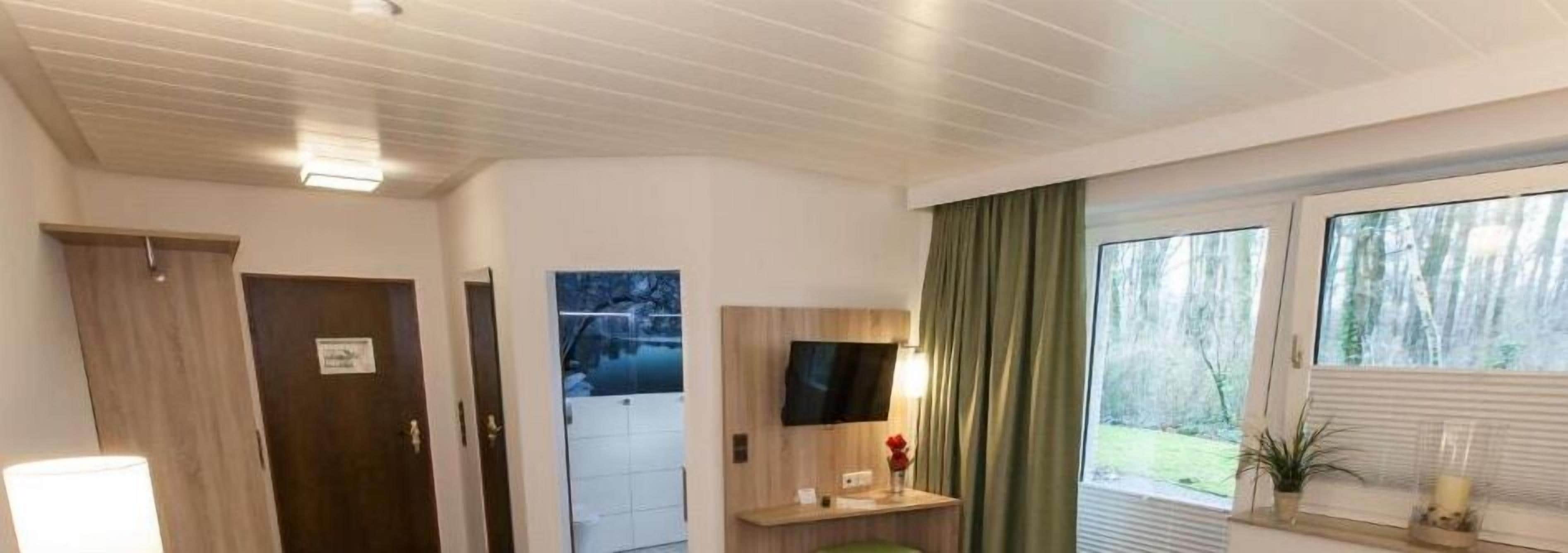 desk, blackout curtains, soundproofing, cots/infant beds