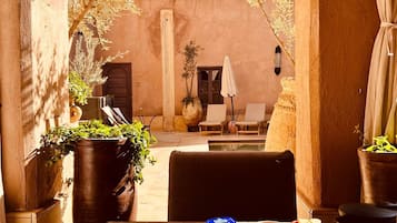 Breakfast, lunch, dinner served; local cuisine