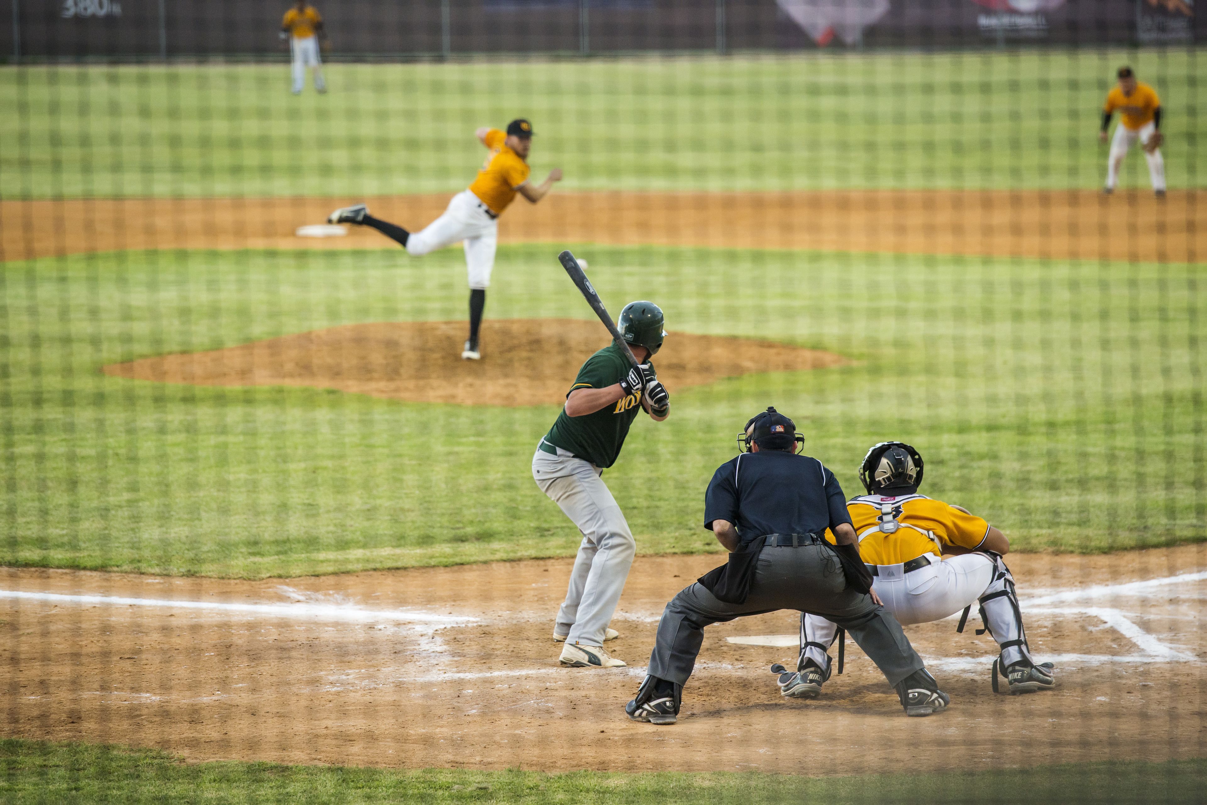 A baseball game in progress with players on the field.