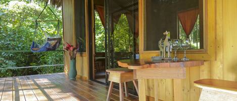 Deluxe Bungalow, Garden Area | Terrace/patio