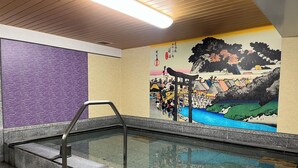 A public indoor pool with a mural, stone steps, and a metal handrail. - Hotel Hokke Club Shonan - Fujisawa (Fujisawa)