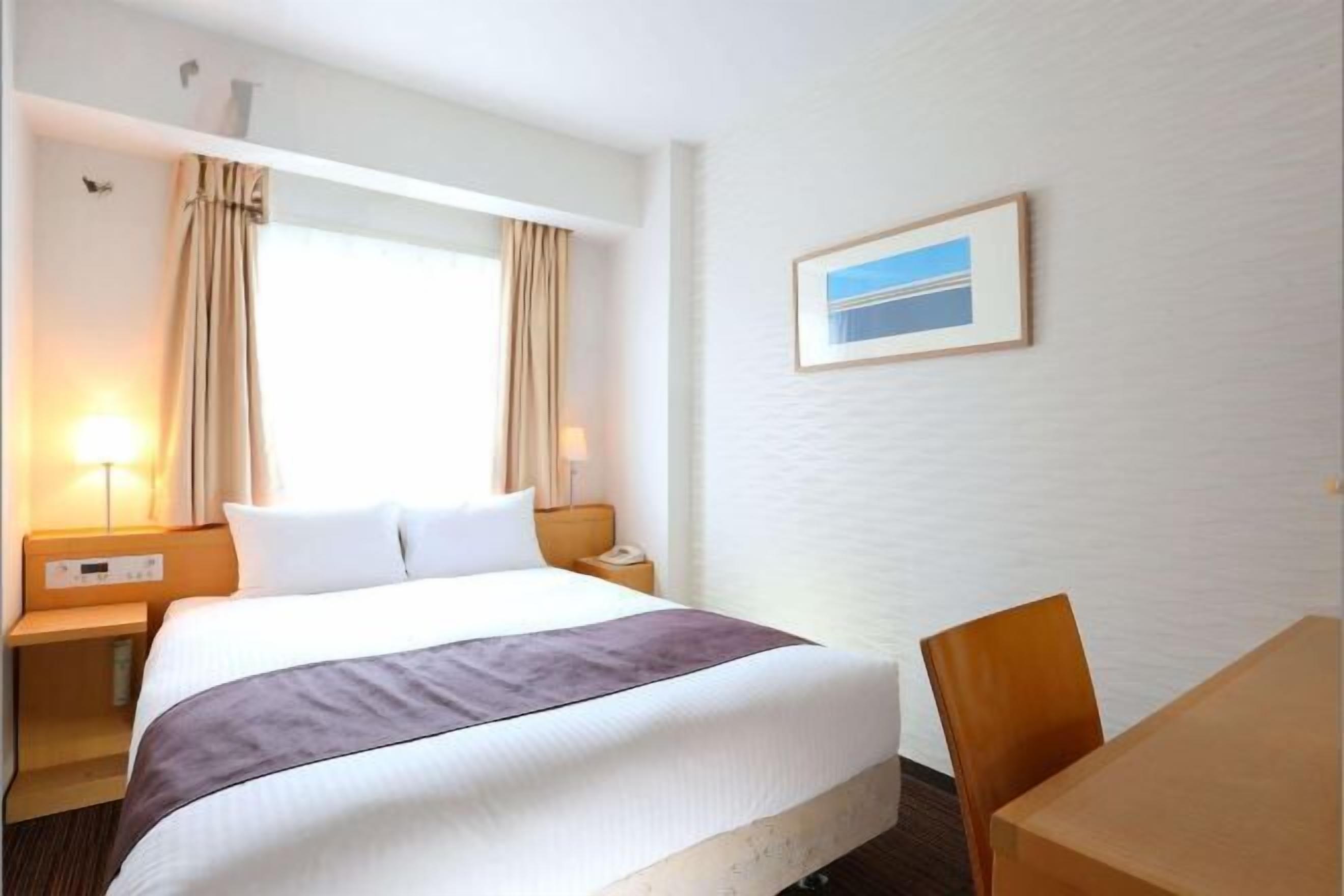 Down duvets, desk, blackout curtains, iron/ironing board