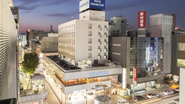 A multi-story hotel with a prominent sign for the Hotel Hokke Club. - Hotel Hokke Club Shonan - Fujisawa (Fujisawa)