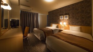A hotel room with two beds, a desk, a chair, a television, and a window with curtains. - Hotel Hokke Club Shonan - Fujisawa (Fujisawa)