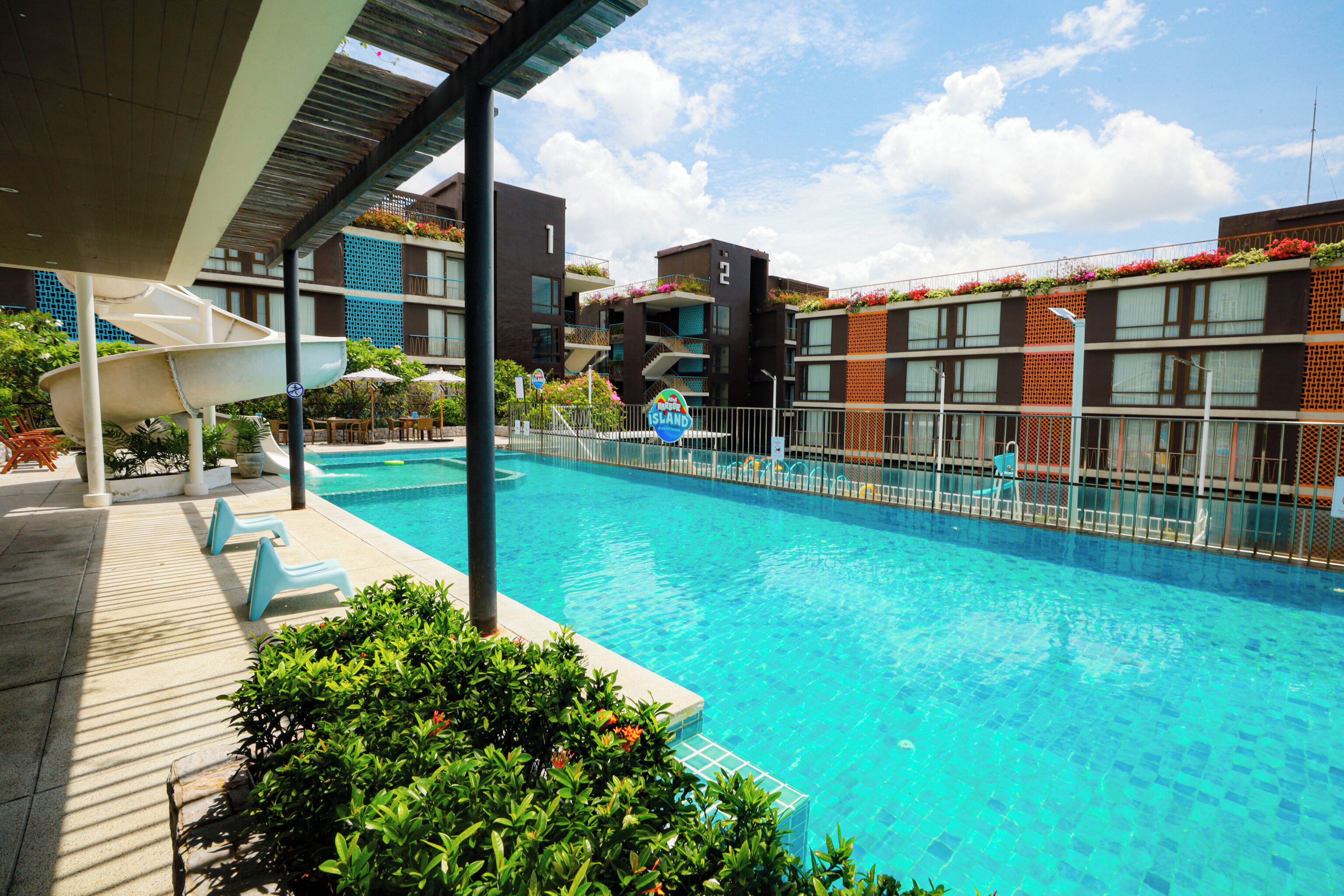 Outdoor pool, open 8:00 AM to 8:00 PM, sun loungers