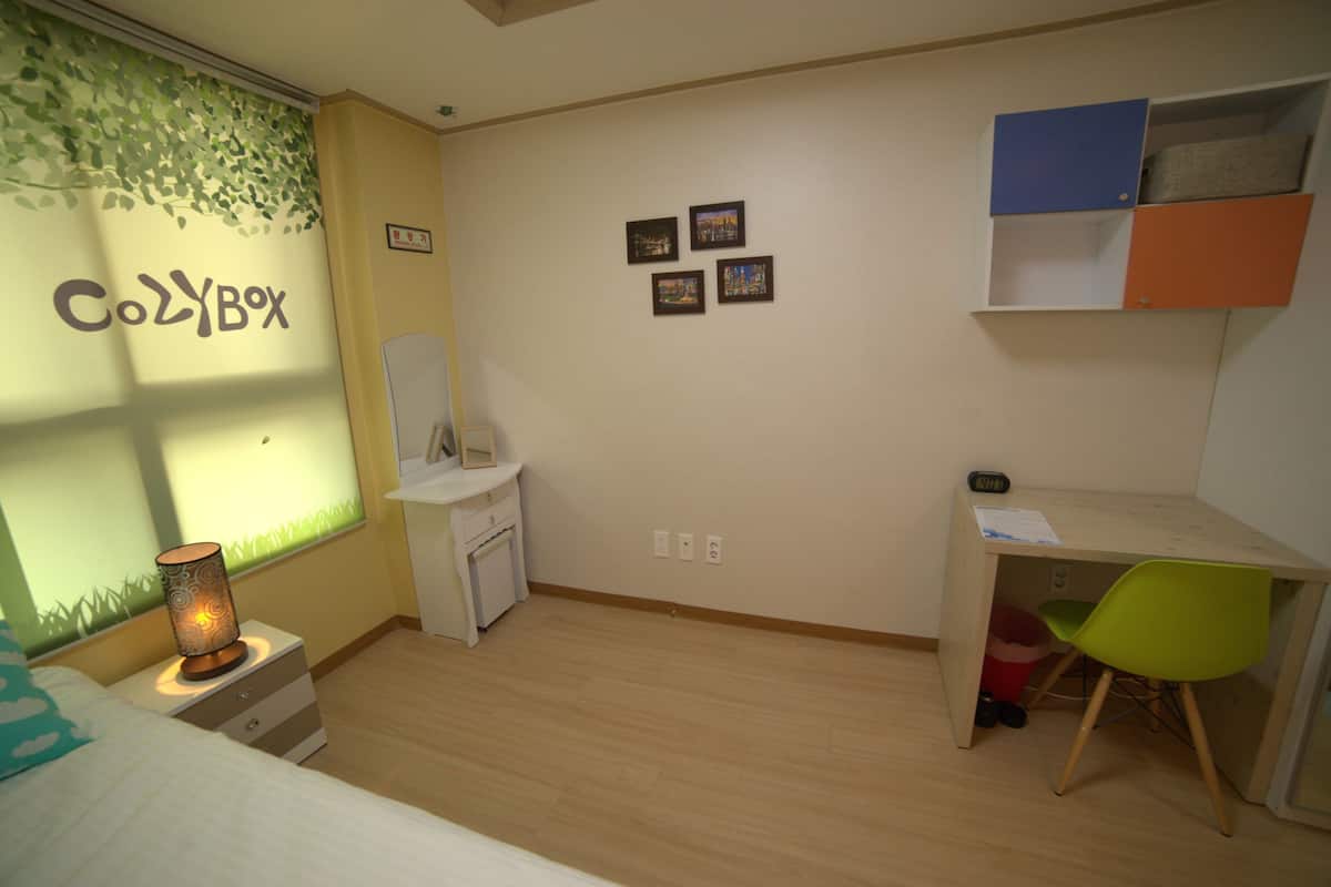 Desk, blackout drapes, rollaway beds (surcharge), WiFi (free)