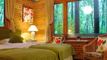 Log Cottage | Down comforters, minibar, desk, iron/ironing board (on request)